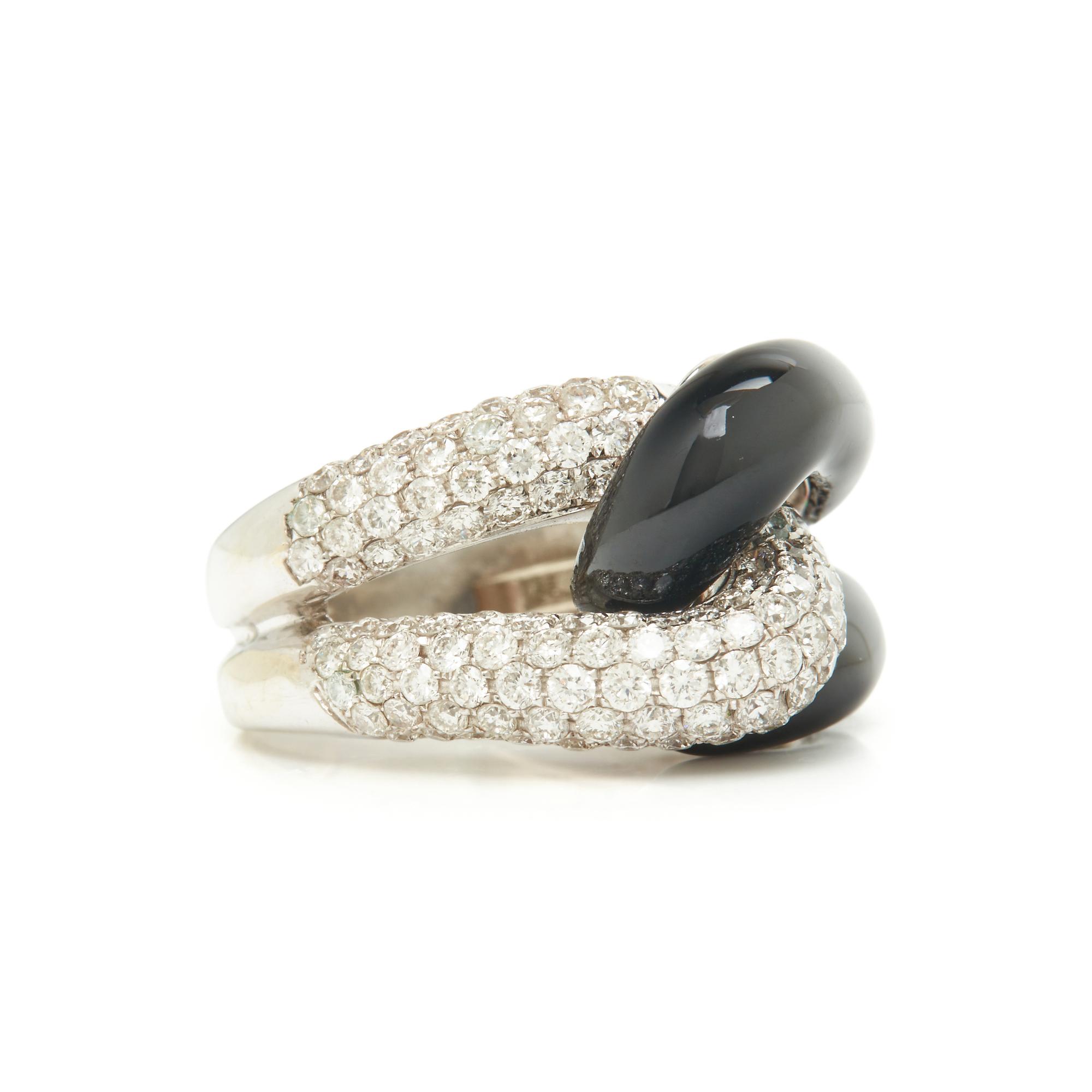 WHITE GOLD, DIAMOND AND BLACK ONYX RING