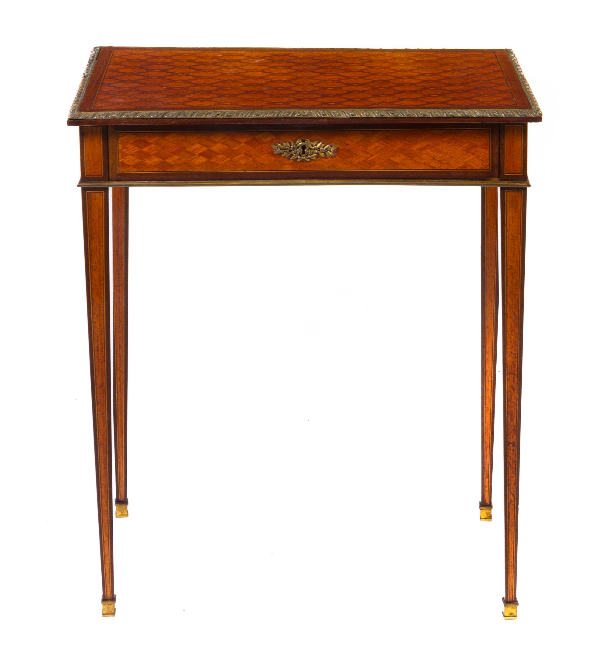A Louis XVI Style Gilt Metal Mounted Parquetry Inlaid Mahogany Side Table, Height 30 1/2 x width 26 1/4 x depth 16 3/4 inches.