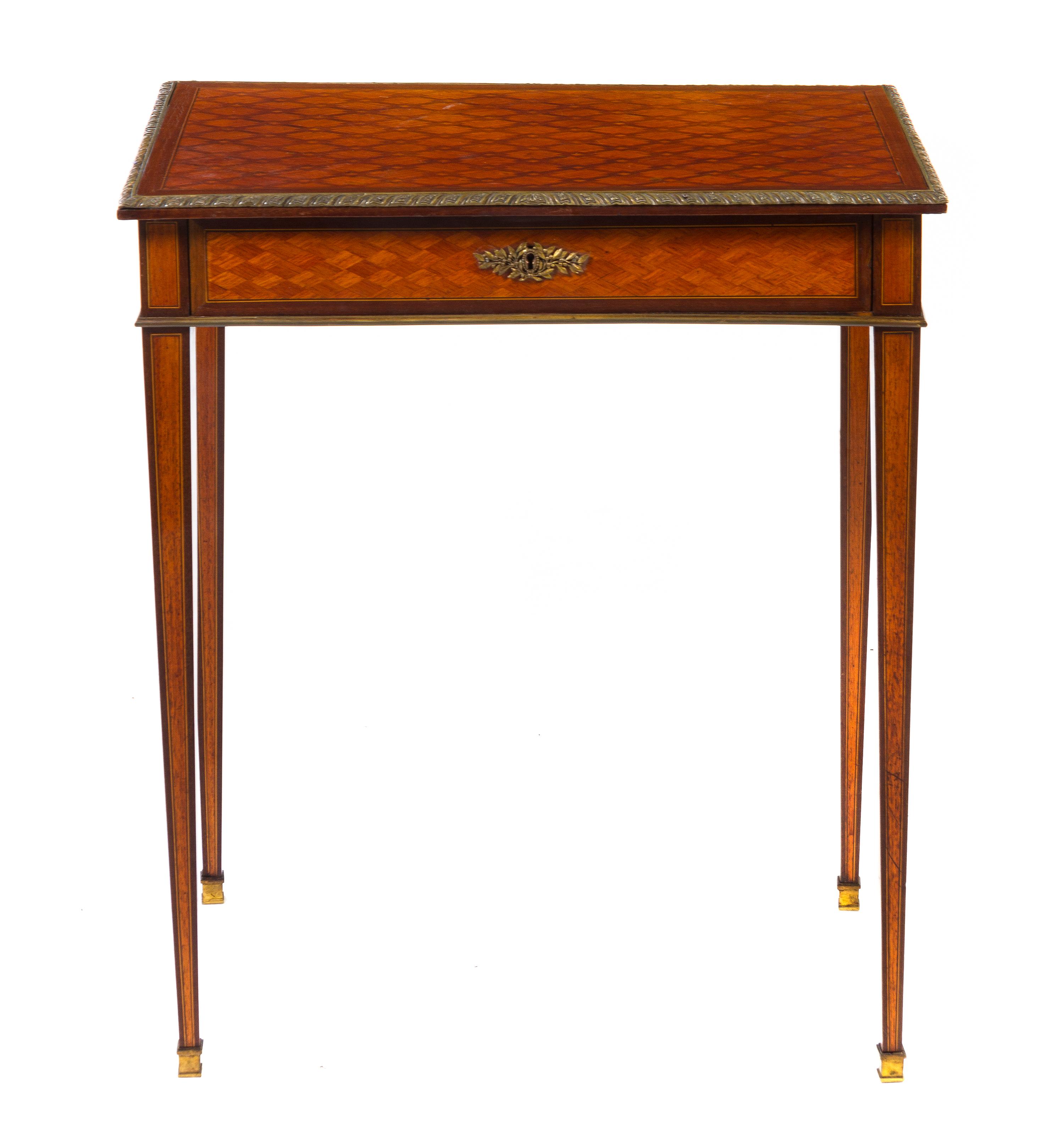 A Louis XVI Style Gilt Metal Mounted Parquetry Inlaid Mahogany Side Table, Height 30 1/2 x width 26 1/4 x depth 16 3/4 inches.