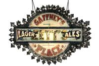 A Zett's Lager and Ales Reverse Painted Glass and Pressed Metal Double-Sided Lighted Bar Sign