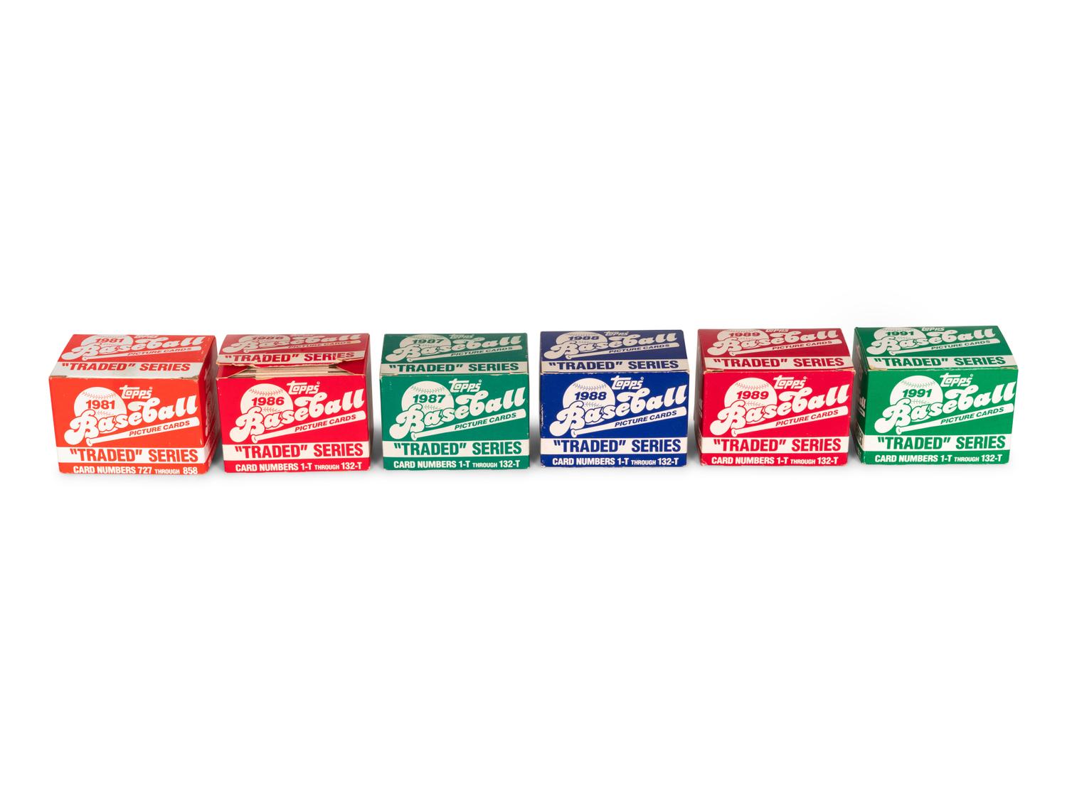 A Group of Seven 1980s-90s Topps Traded Baseball Card Sets,