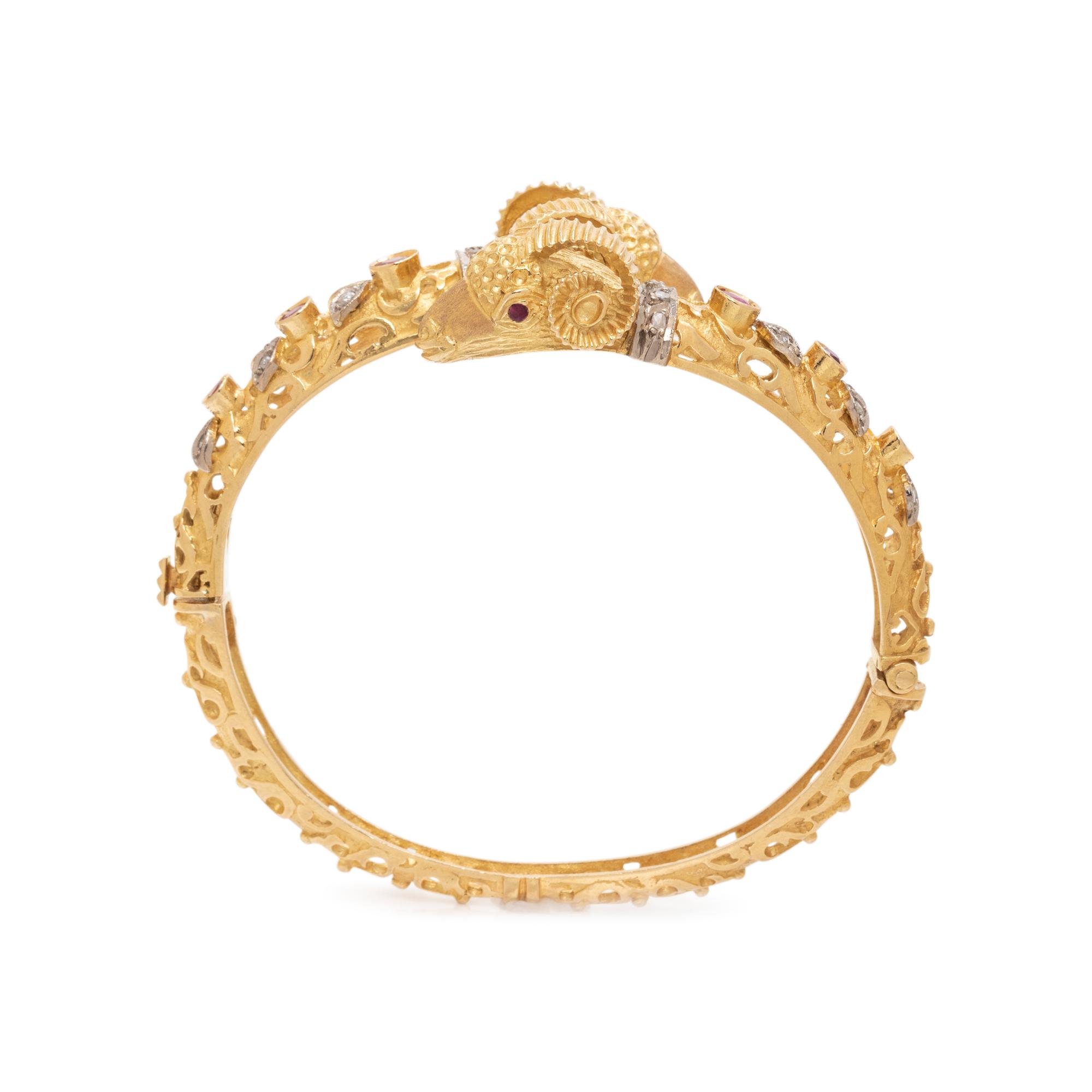 HIGH KARAT YELLOW GOLD, DIAMOND AND RUBY RAMS HEAD BRACELET