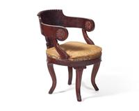 A Classical Carved And Veneered Mahogany Bucket Chair