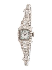 GRUEN, PLATINUM AND DIAMOND WATCH