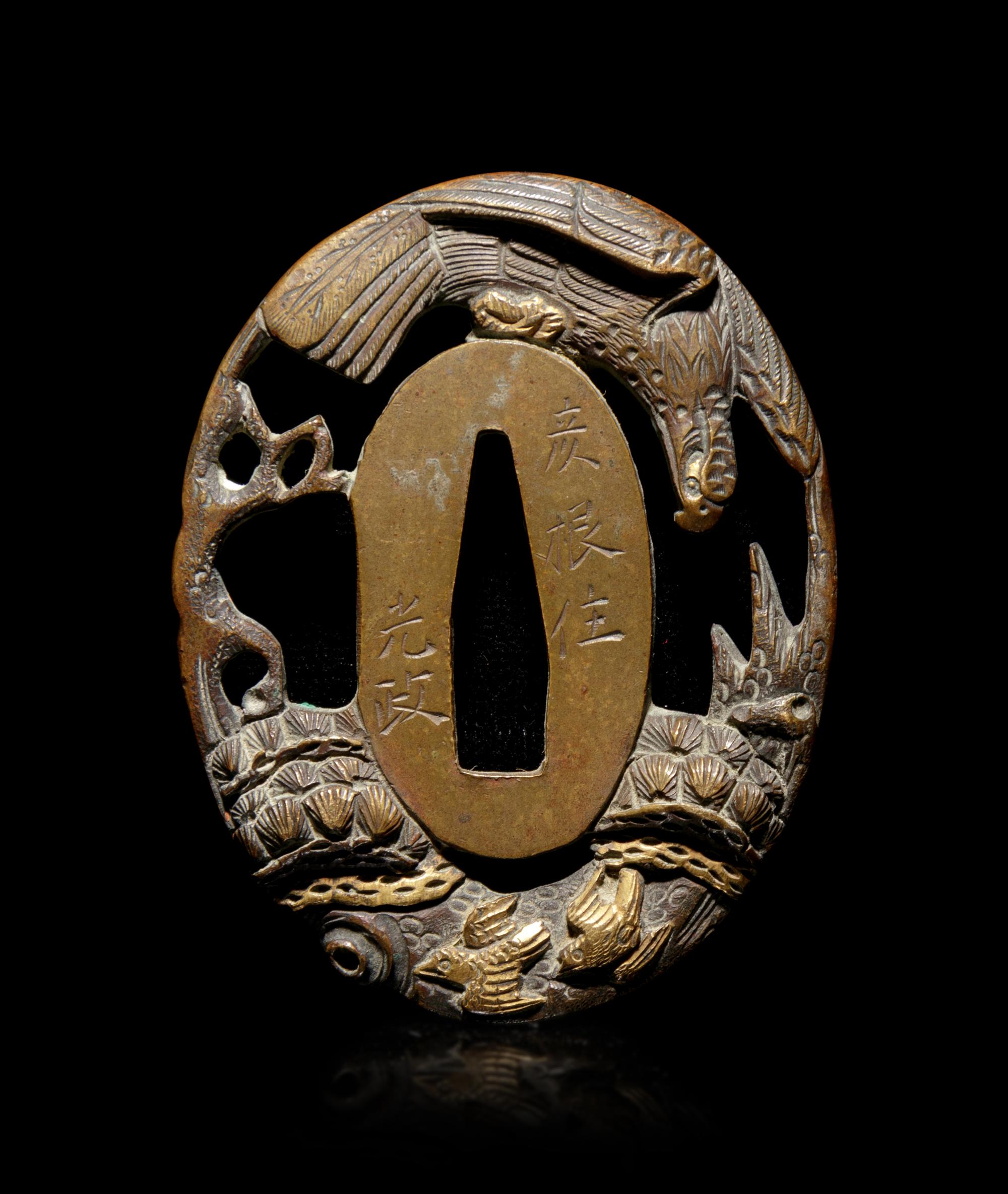 A Gilt Bronze Tsuba