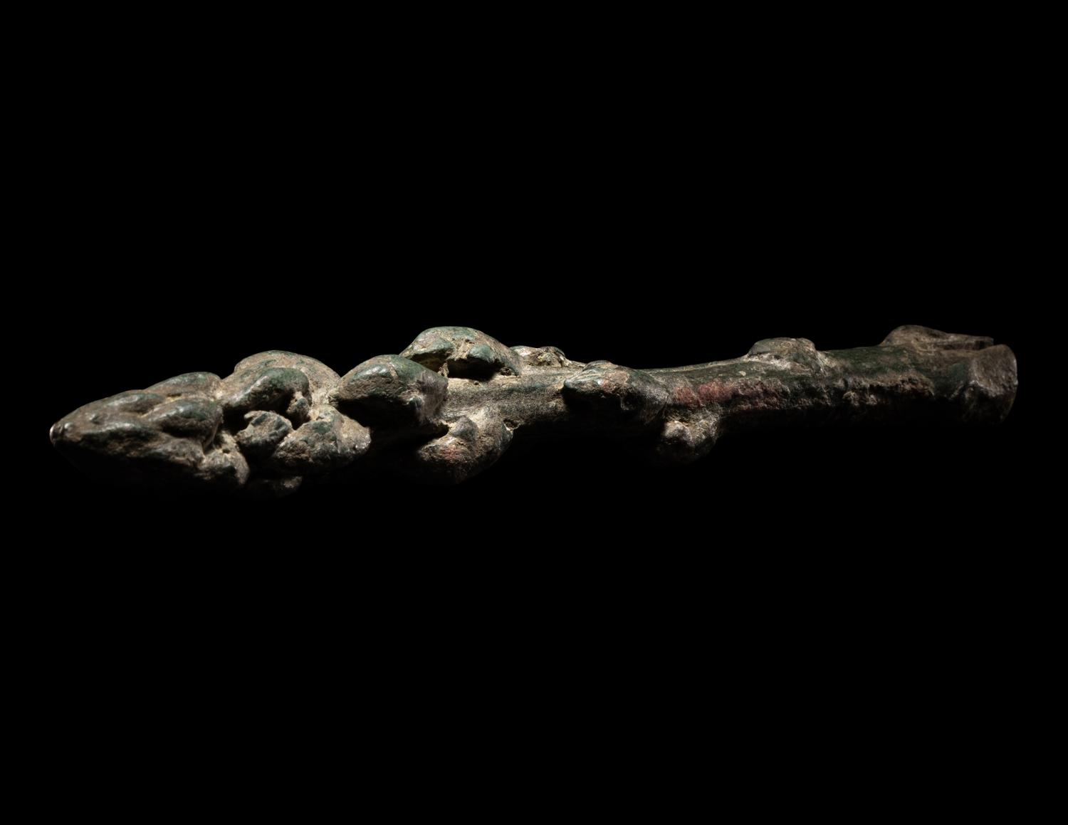 A Roman Bronze Asparagus and a Roman Bronze Hand Pin