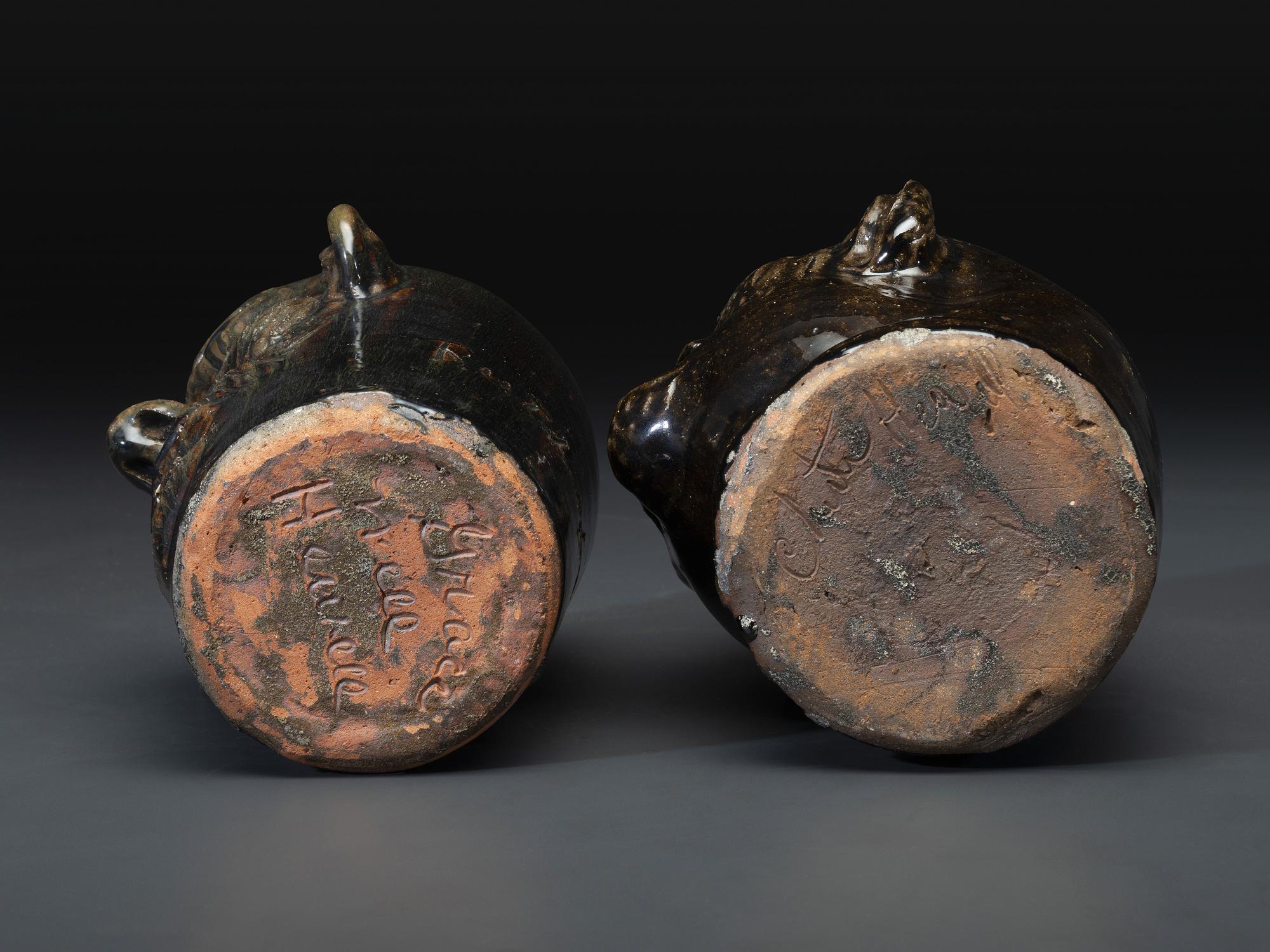 Two Southern Stoneware Face Jugs