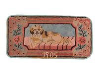 A Large Spaniel Hooked Rug