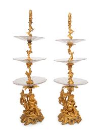 A Pair of French Gilt Bronze and Glass Three-Tier Stands