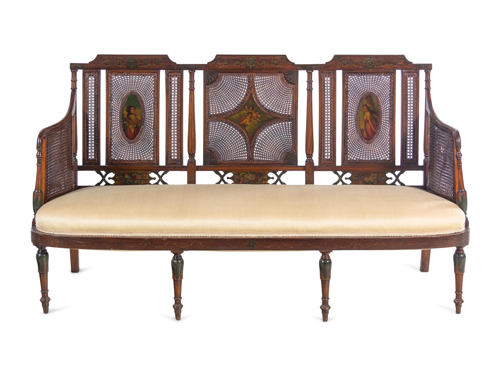 An Edwardian Painted Satinwood Caned Settee