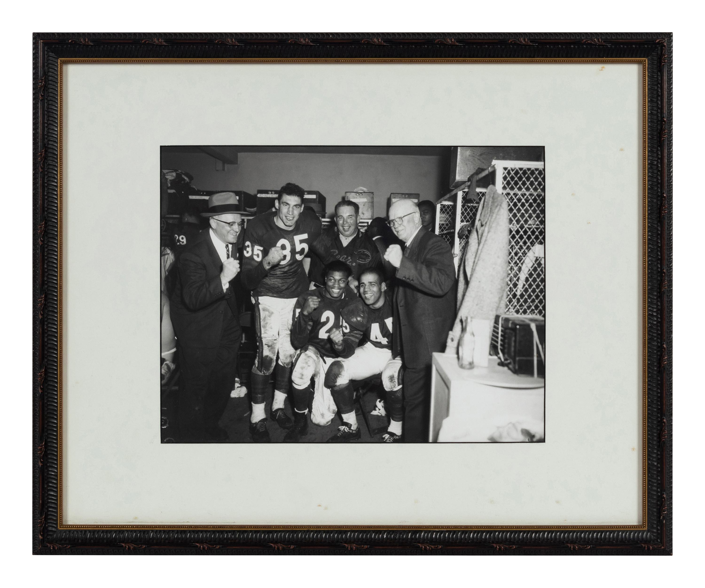 A Group of 14 Photographs of George Halas Formerly Displayed at Mike Ditka's Restaurant