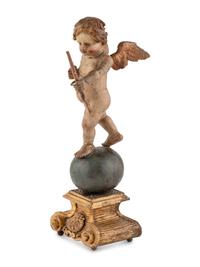 A Continental Painted and Parcel Gilt Cherub Ornament