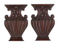 A Pair of Renaissance Revival Carved Walnut Urn-Form Panels