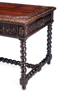 A French Renaissance Revival Carved Oak Library Table