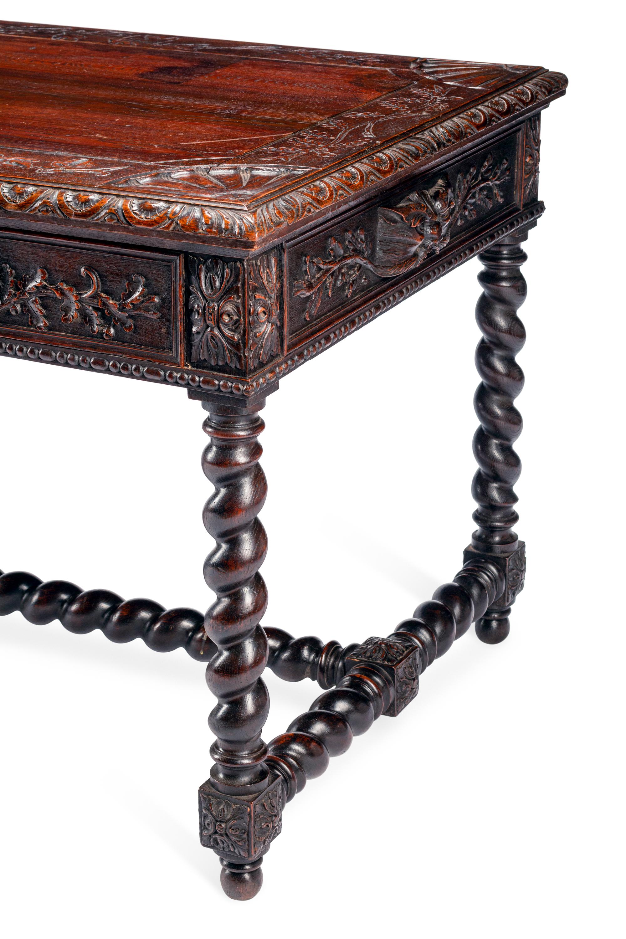 A French Renaissance Revival Carved Oak Library Table
