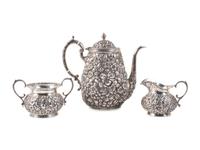 A Repousse Silver Three-Piece Tea Service