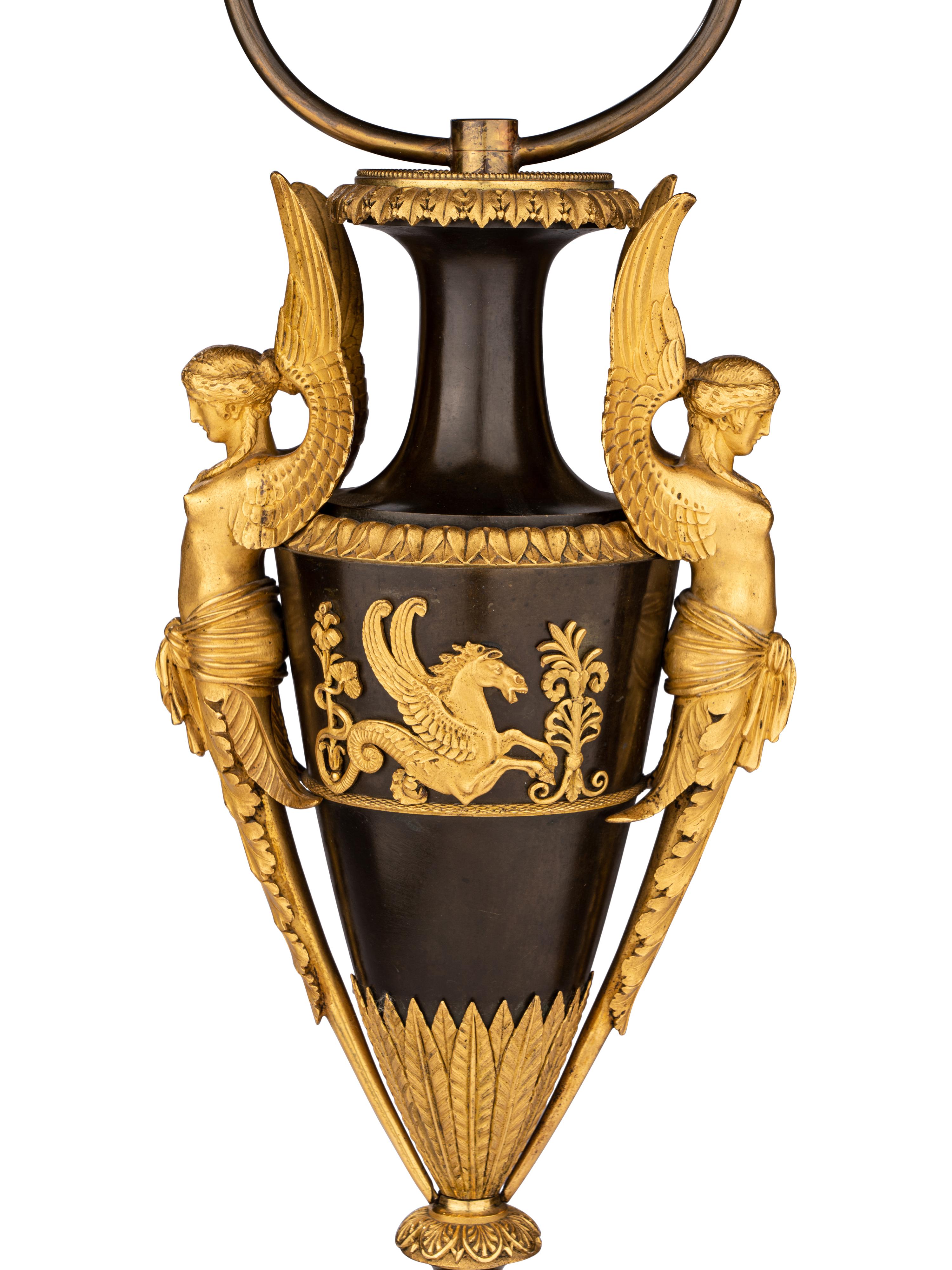 A Pair of Directoire Ormolu and Patinated Bronze Urns