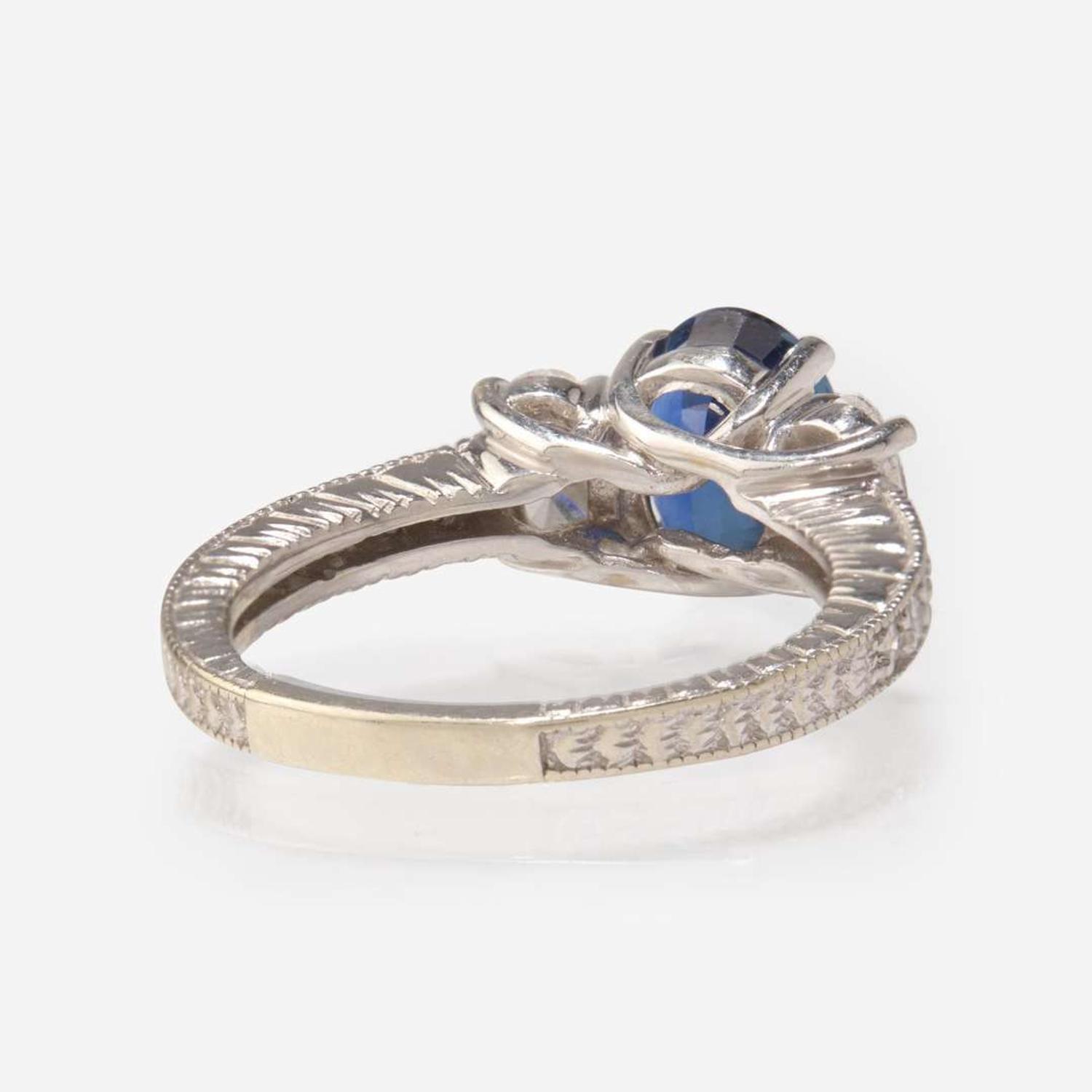 A Sapphire and Diamond White Gold Ring