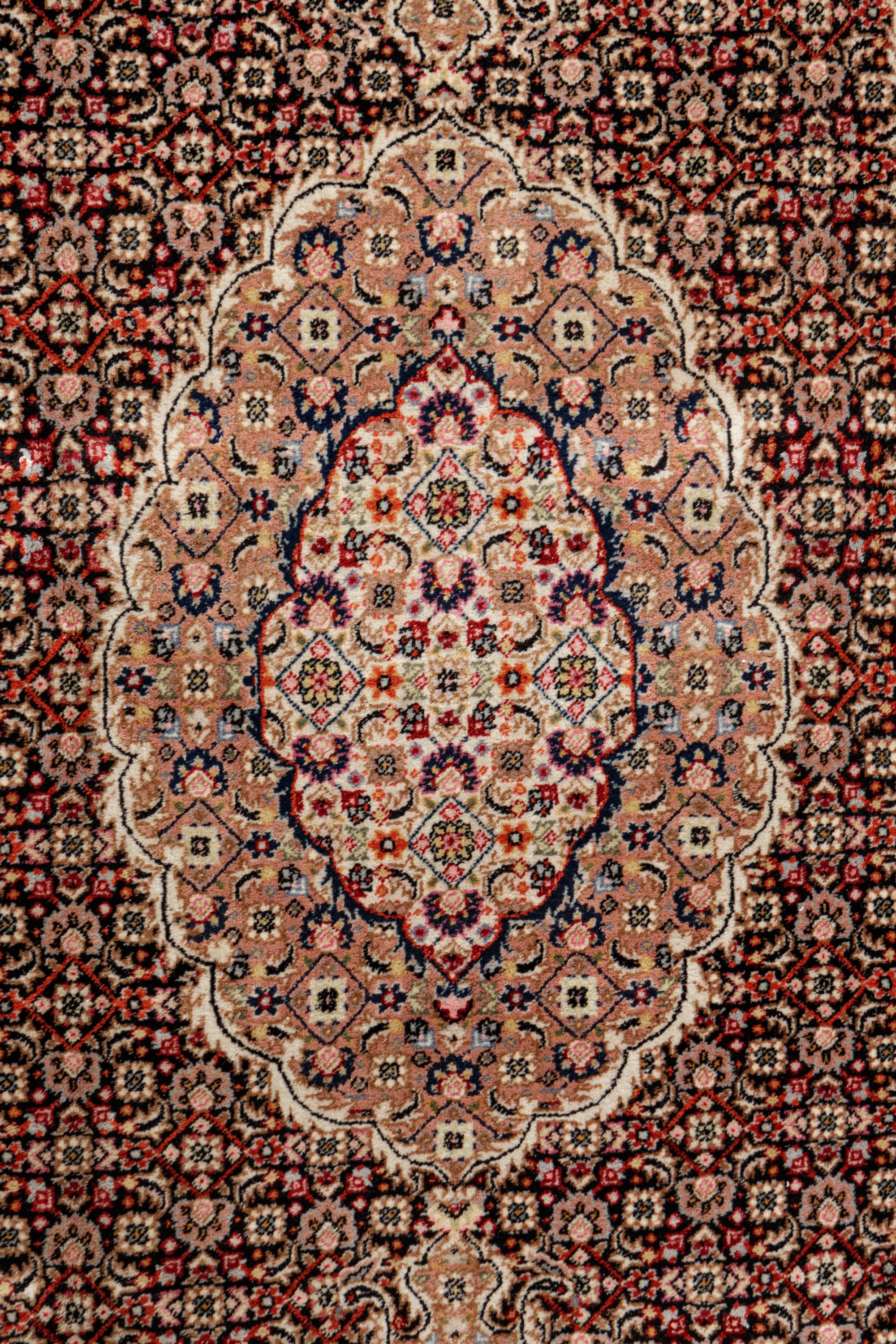 A Tabriz Wool Rug