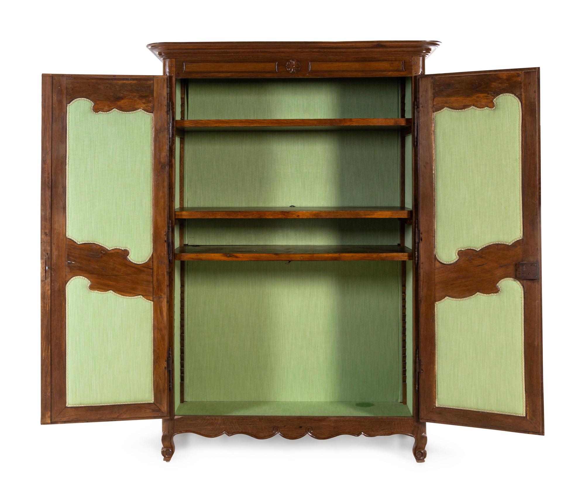 A French Provincial Walnut Armoire