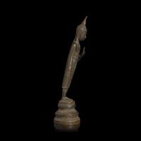 An Eastern Thai Bronze 'Leaning Buddha', 17th–18th Century — 十七至十八世紀 泰國東部 銅佛立像