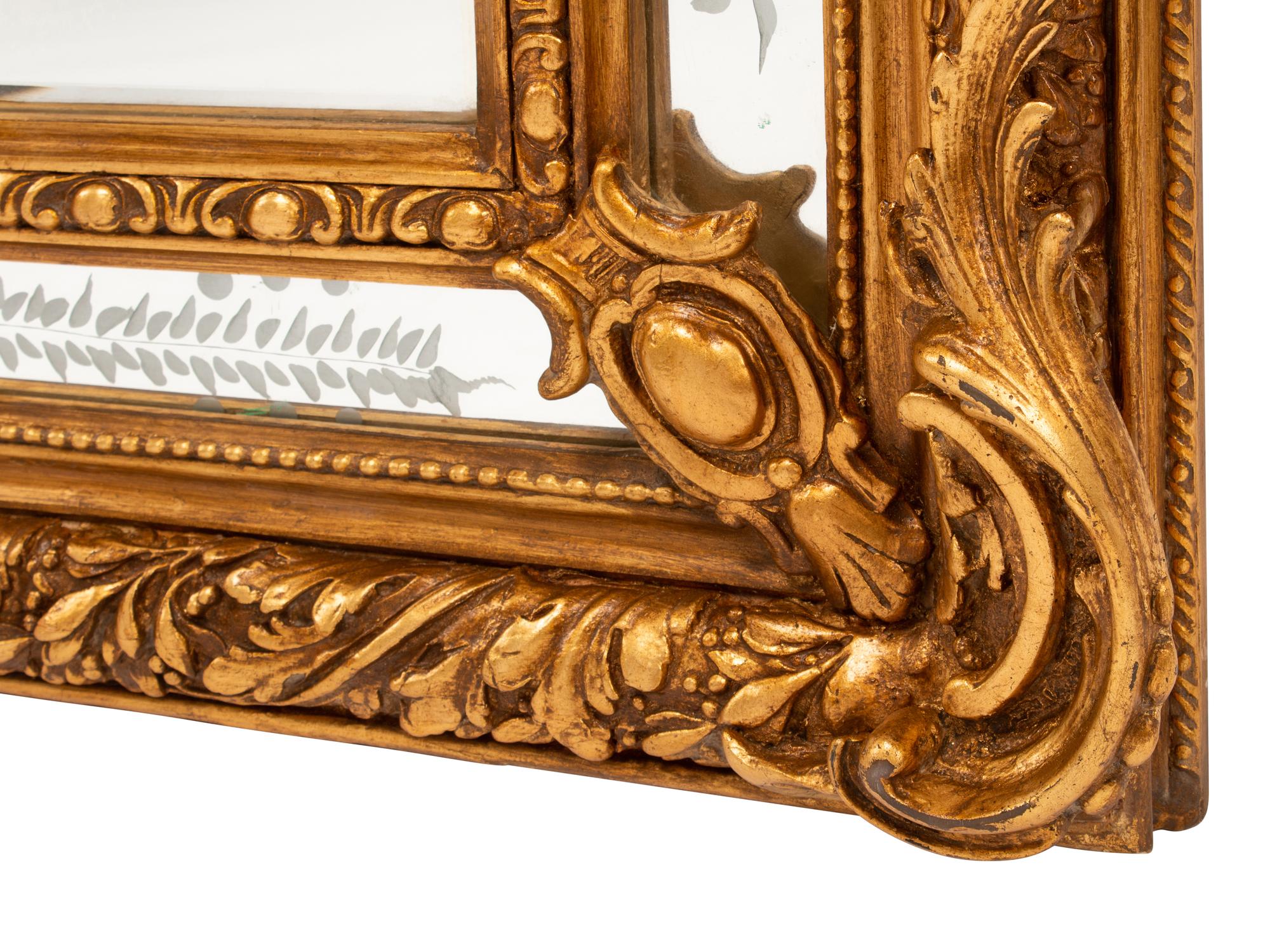 A Pair of Louis XV Style Gilt and Engraved Mirrors