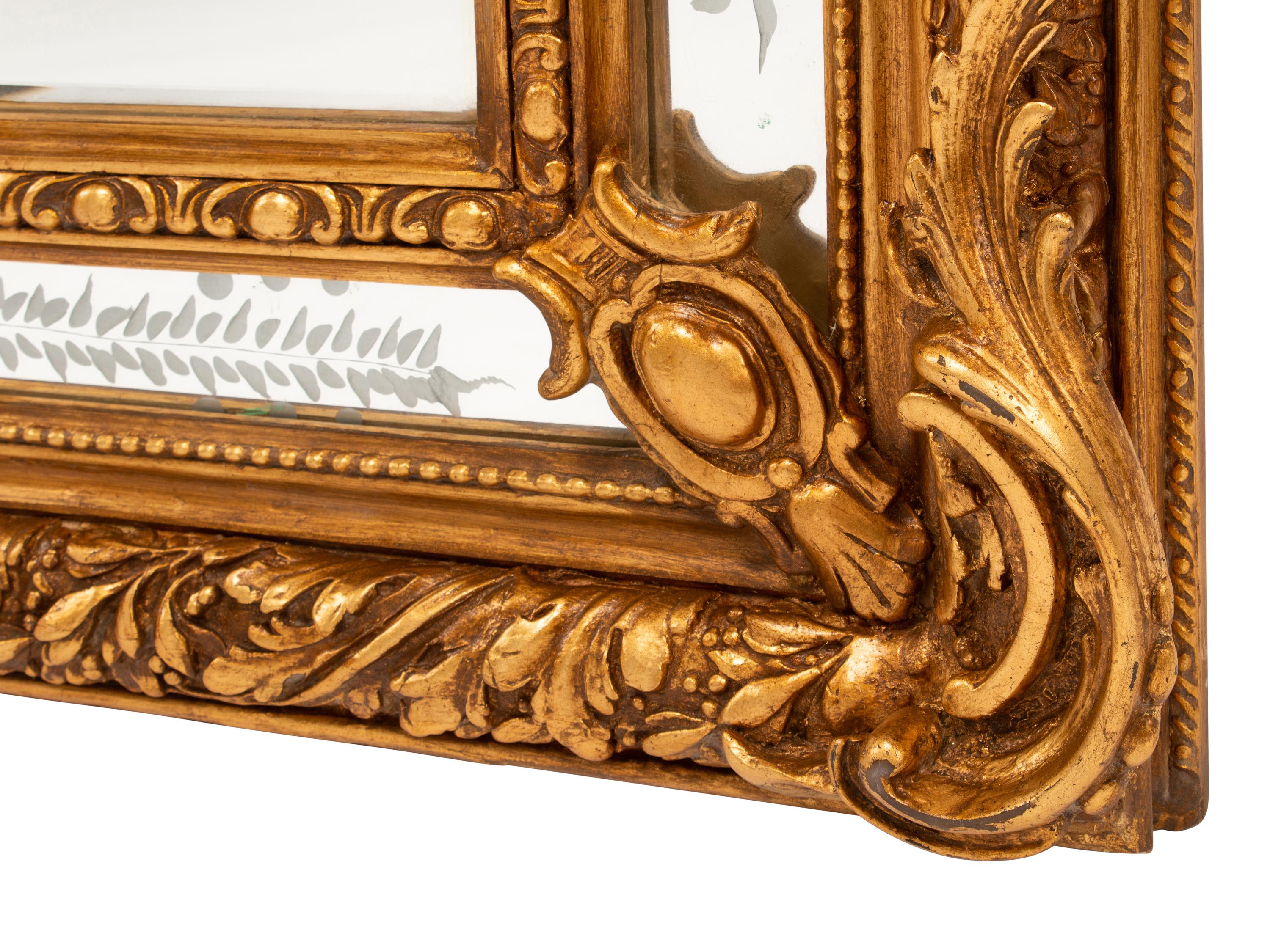 A Pair of Louis XV Style Gilt and Engraved Mirrors