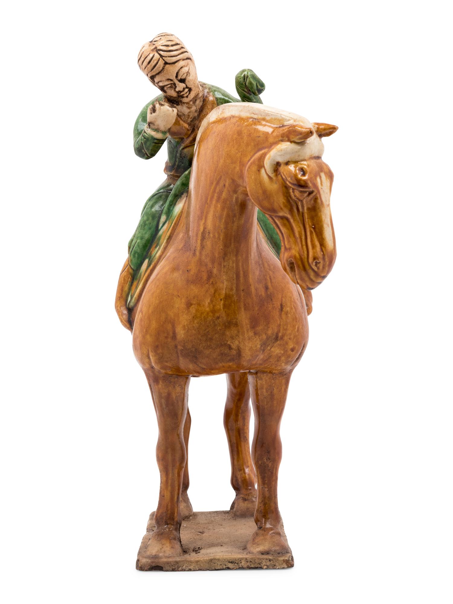 A Chinese Sancai Glazed Burial Figure of a Mounted Attendant