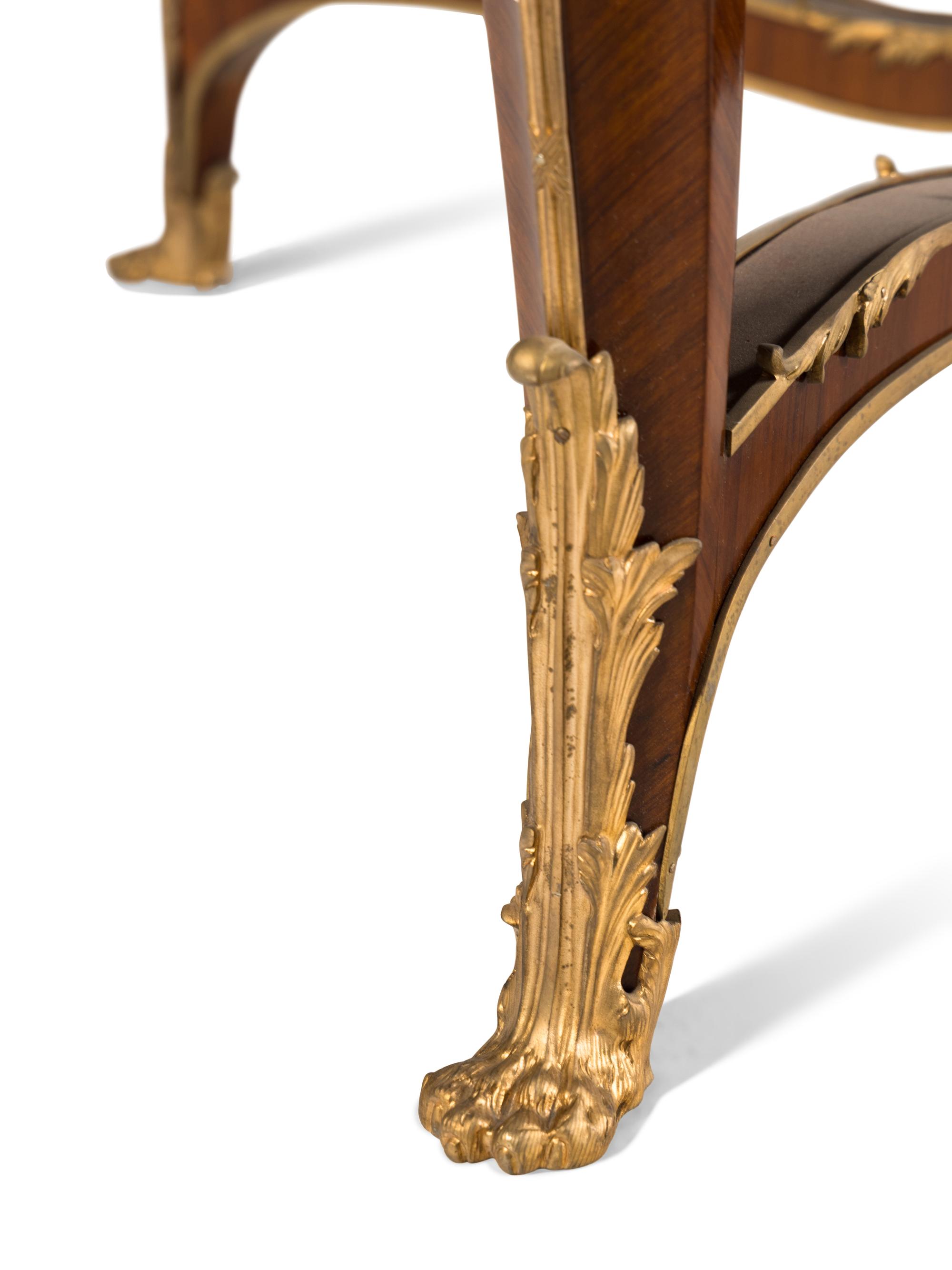 A Louis XV Style Gilt Bronze Mounted Parquetry Marble-Top Center Table