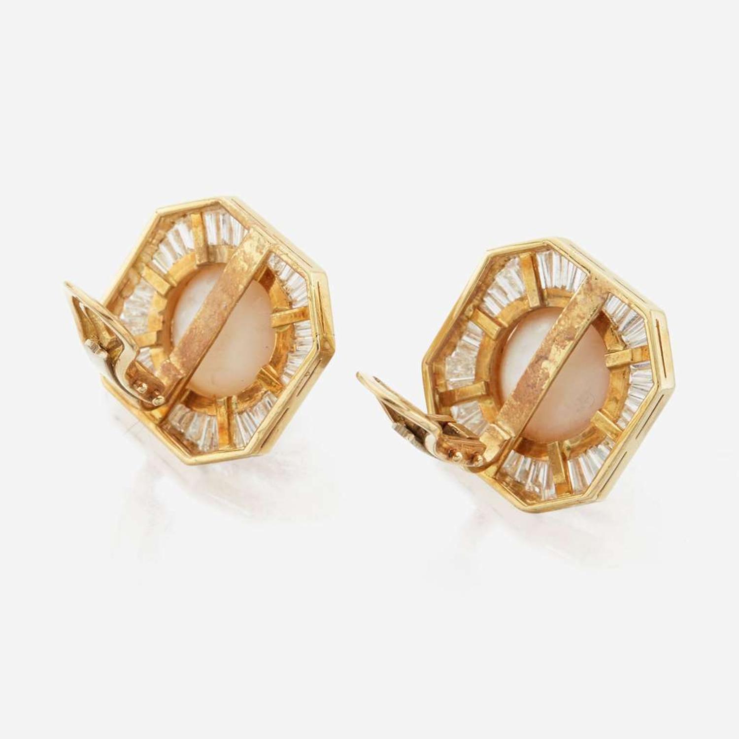 A pair of pearl, diamond and white gold earrings