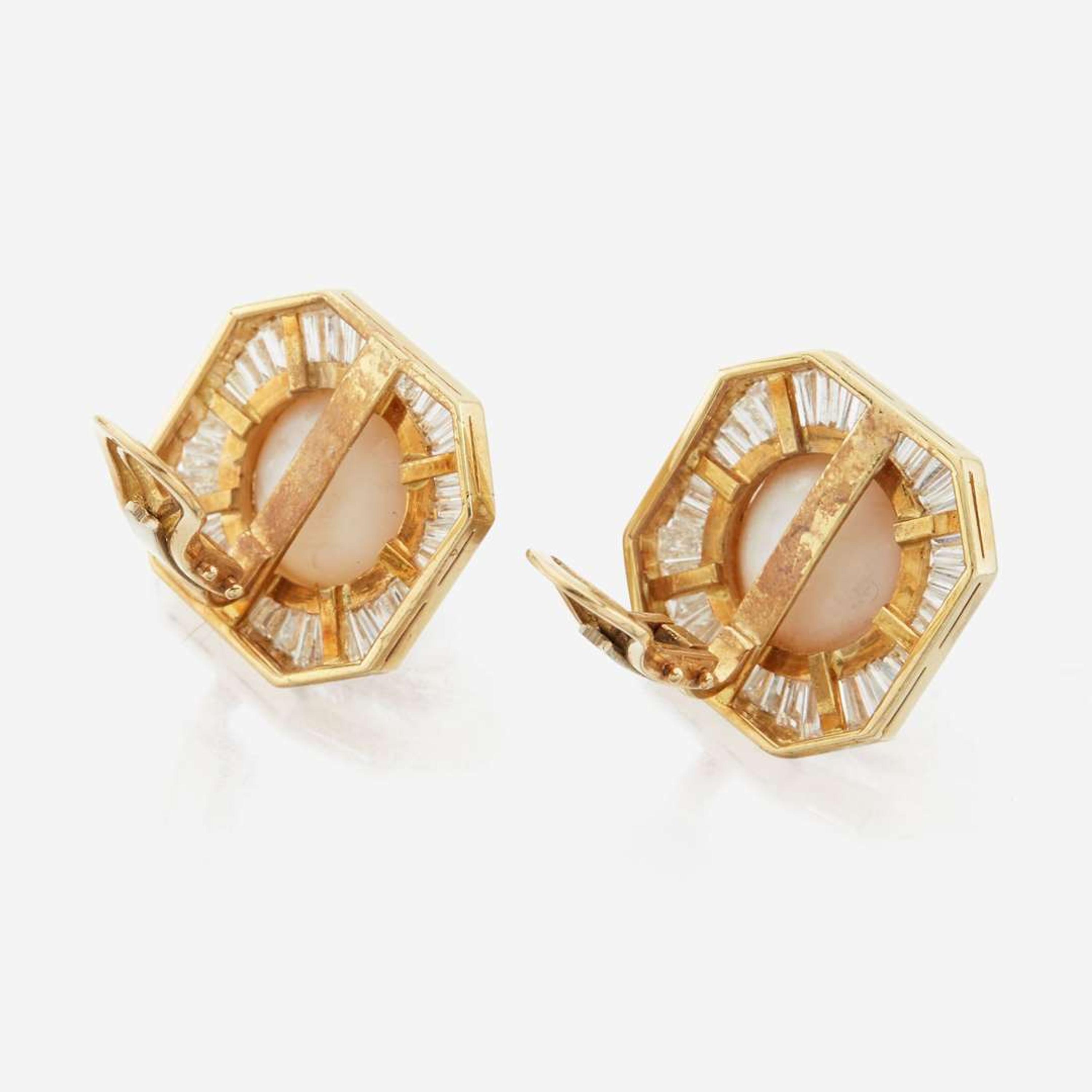 A pair of pearl, diamond and white gold earrings