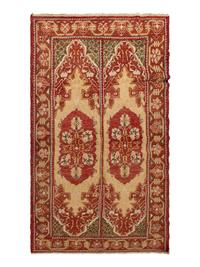 An Oushak Wool Rug