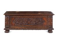 An Italian Carved Walnut Cassone