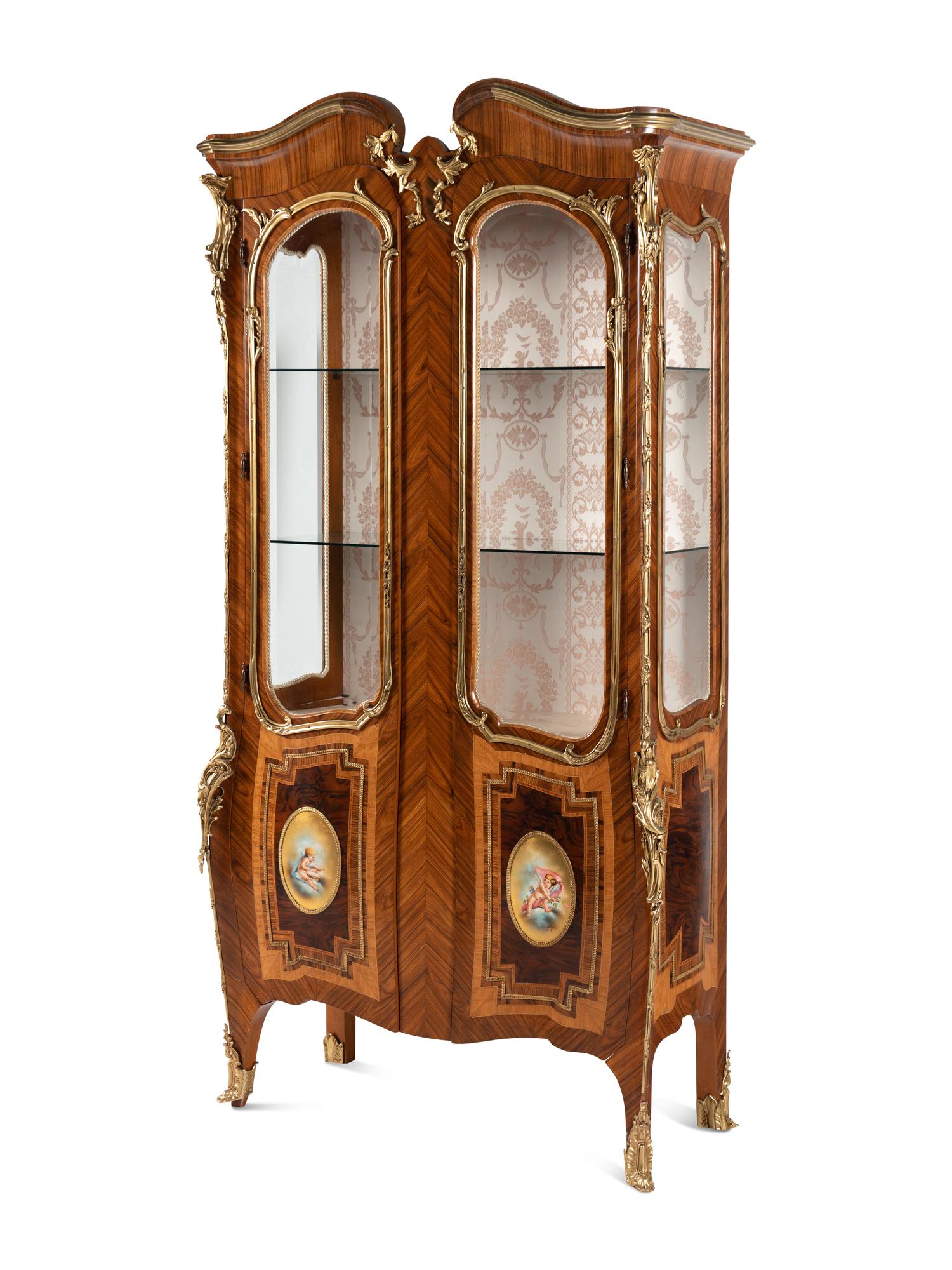 A Pair of Louis XV Style Gilt Bronze Mounted Tulipwood Vitrine Cabinets
