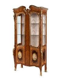 A Pair of Louis XV Style Gilt Bronze Mounted Tulipwood Vitrine Cabinets