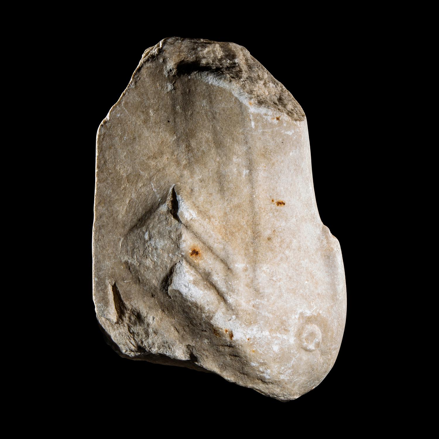 A Roman Marble Support Fragment in the form of a Dolphin