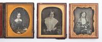 [EARLY PHOTOGRAPHY]. A group of 9 half plate daguerreotypes of women, including: