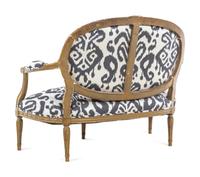 A Louis XVI Style Brunschwig & Fils Upholstered Giltwood Oval Back Settee