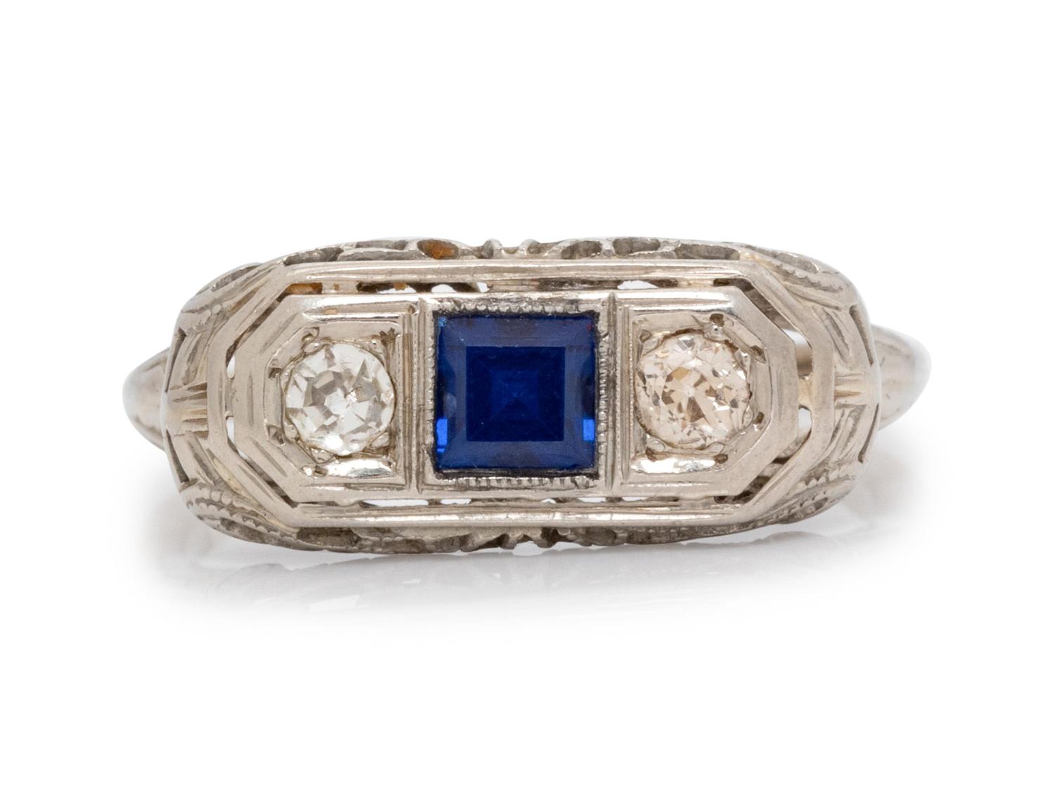 A White Gold, Diamond and Synthetic Sapphire Ring,