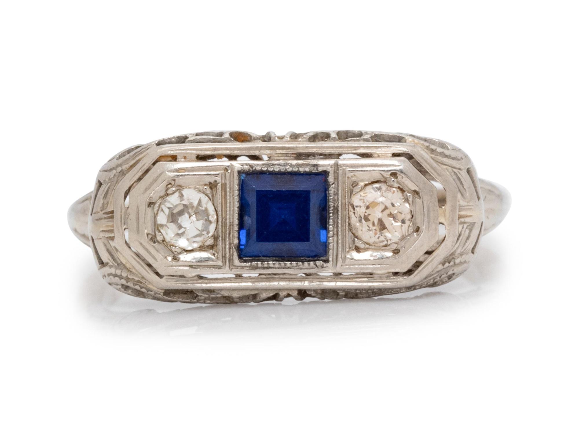 A White Gold, Diamond and Synthetic Sapphire Ring,