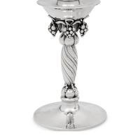 A Pair of Georg Jensen Silver Grape Candlesticks