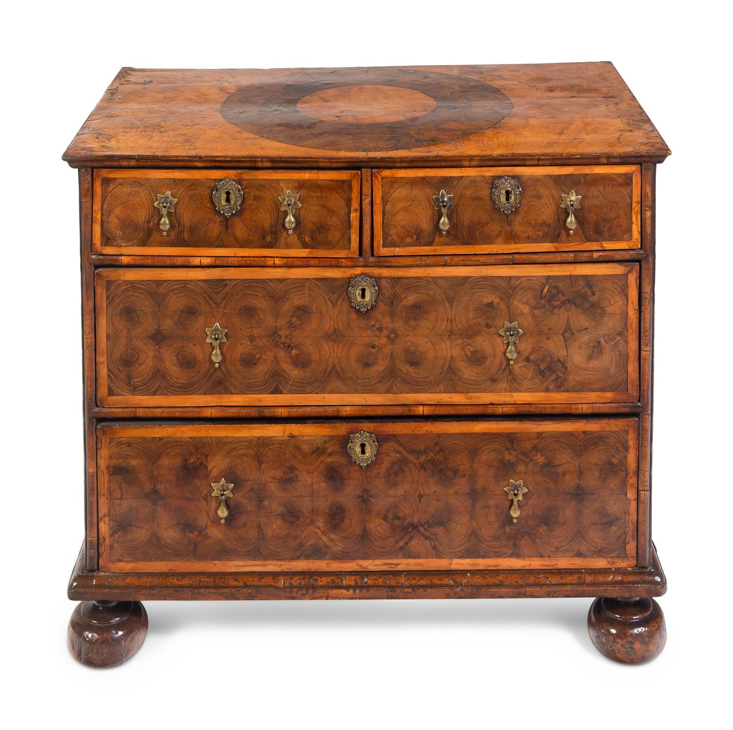 A William and Mary Oysterwood and Figured Walnut Chest of Drawers
