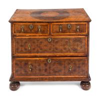 A William and Mary Oysterwood and Figured Walnut Chest of Drawers
