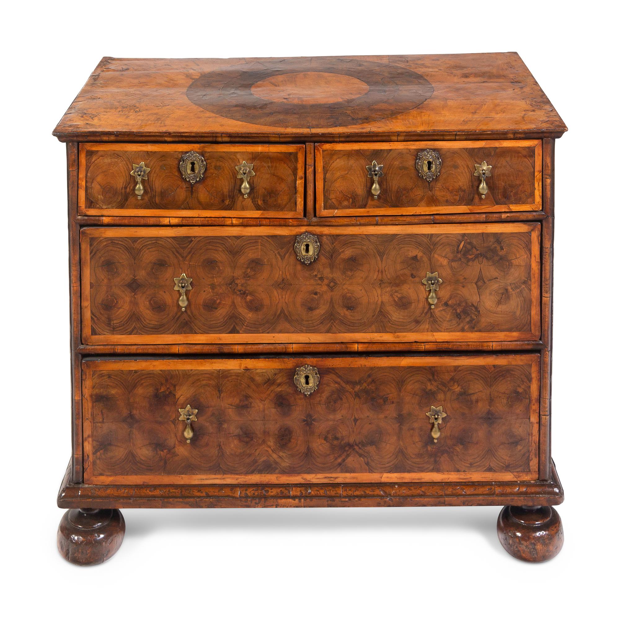 A William and Mary Oysterwood and Figured Walnut Chest of Drawers