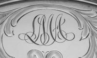 A Set of Twelve American Silver Teacups and Saucers
