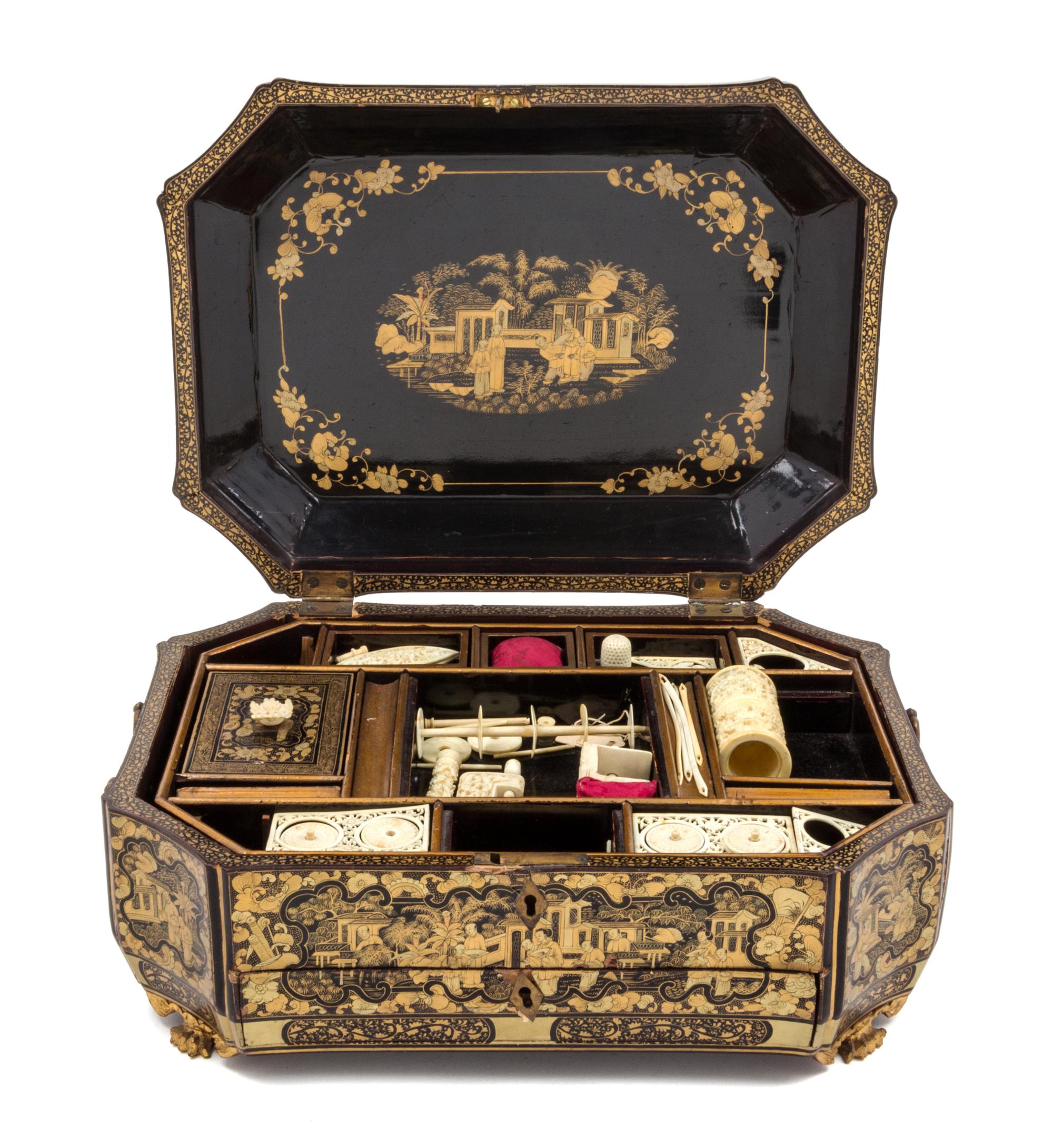 A Chinese Gilt and Black Lacquered Sewing Box Height 6 3/4 x width 14 x depth 10 1/2 inches.