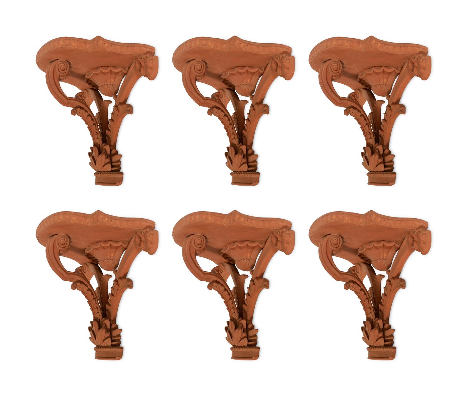 A Set of Six Terracotta Wall Brackets