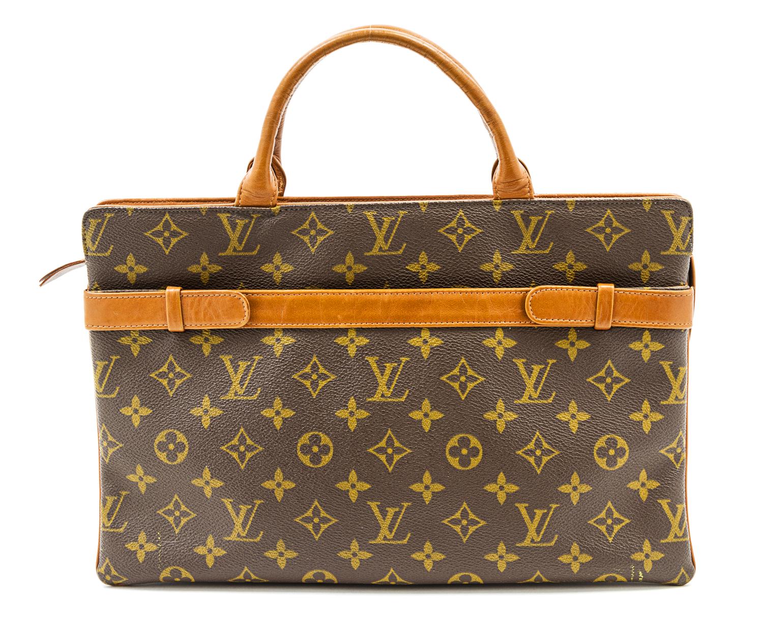 A Louis Vuitton Monogram Canvas Bag, 13 x 8 1/2 x 3 inches.