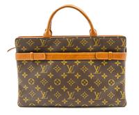 A Louis Vuitton Monogram Canvas Bag, 13 x 8 1/2 x 3 inches.