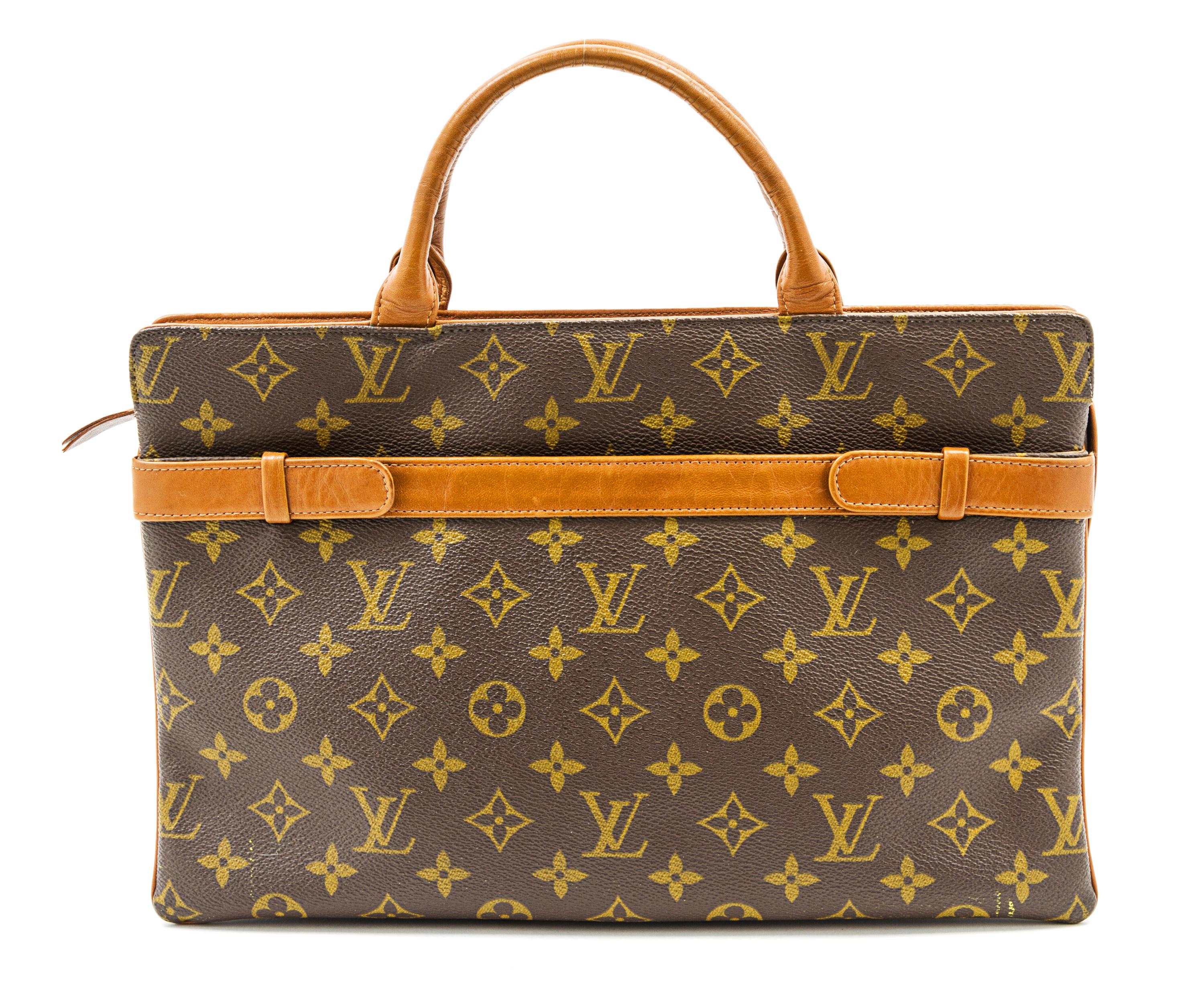 A Louis Vuitton Monogram Canvas Bag, 13 x 8 1/2 x 3 inches.